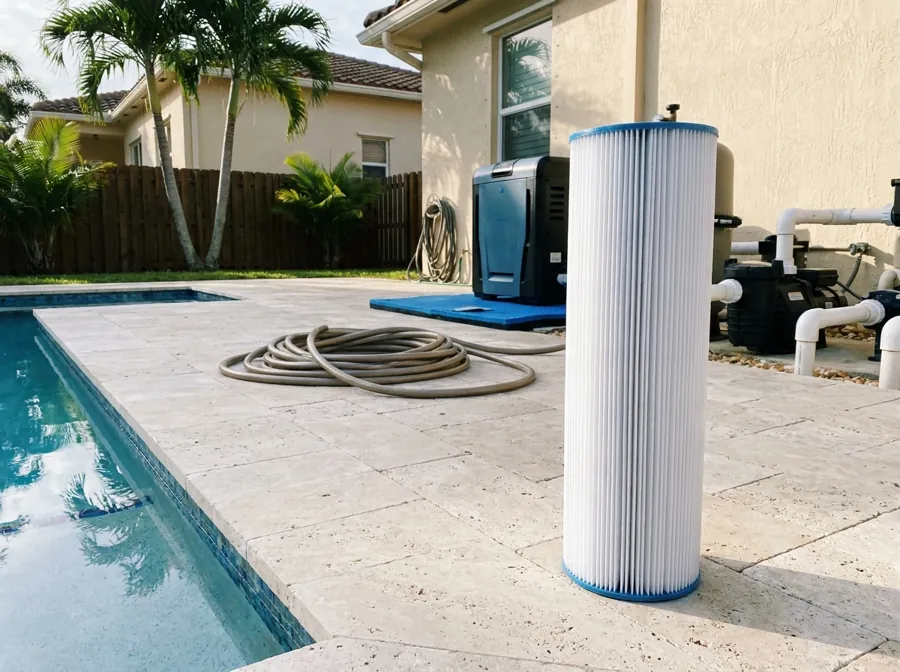 Proof: the cleaned pool filter beside the pool.